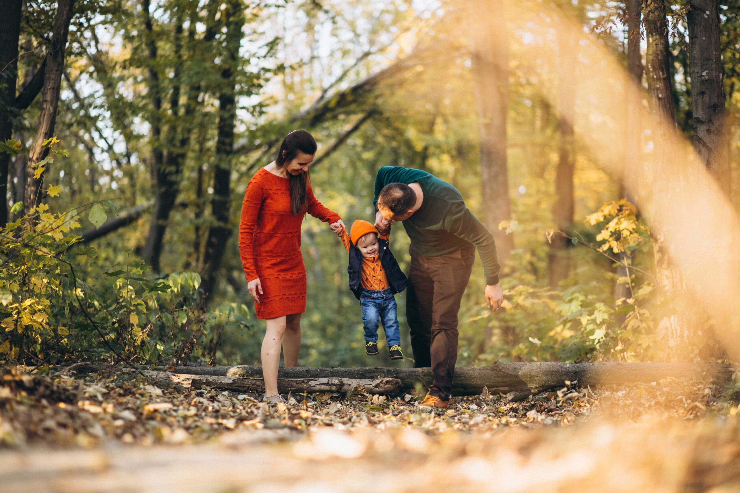 People walking in a sunny forest